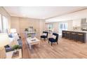 Open living space featuring a neutral color palette and hardwood floors at 414 Caties View Way, Moncks Corner, SC 29461