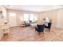Bright and airy living room with hardwood floors and a neutral color scheme at 414 Caties View Way, Moncks Corner, SC 29461