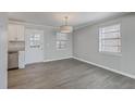 Dining area with hardwood floors and a view of the kitchen at 415 Parkdale Dr # 16-F, Charleston, SC 29414