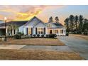 Two-story house with gray siding, white trim, and a two-car garage at 559 Tidewater Chase Ln, Summerville, SC 29486