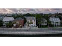 Modern home on a tree-lined street with city views at 100 Murray Blvd, Charleston, SC 29401