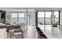 Bright living room with water views and modern furniture at 100 Murray Blvd, Charleston, SC 29401