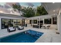 Relaxing pool and patio area with outdoor kitchen at 100 Murray Blvd, Charleston, SC 29401