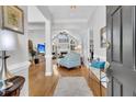 Bright and spacious entryway with hardwood floors and views into living room at 1449 Waterside Ct, Mount Pleasant, SC 29464