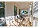 Spacious front porch with seating area and white railings at 1525 Kepley Dr, Mount Pleasant, SC 29464