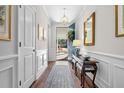 Bright entryway with hardwood floors and console table at 2020 Parish House Cir, Johns Island, SC 29455
