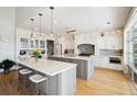 Gourmet kitchen boasts double islands, white cabinets, and stainless steel appliances at 2737 Sarazen Dr, Mount Pleasant, SC 29466