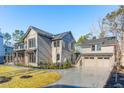 Stylish home with attached garage and walkway leading to the front door at 3917 Delinger Dr, Mount Pleasant, SC 29466