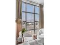 Stunning city view from the living room's large windows at 5 Gadsdenboro St # 410, Charleston, SC 29401