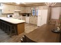 Well-equipped kitchen with ample counter space and dining area at 603 Portia St, Edisto Beach, SC 29438