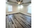 Spacious bedroom with wood-look flooring and ceiling fan at 1034 Weeks Lane, Round O, SC 29474