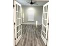 Bright office with French doors and wood-look flooring at 1034 Weeks Lane, Round O, SC 29474