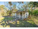 Small, rustic cottage with a porch needs renovation at 4228 Barnwell Ave, North Charleston, SC 29405