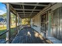 Rustic wooden porch, showing age and needs repair at 4228 Barnwell Ave, North Charleston, SC 29405