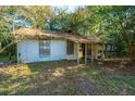 Small, dilapidated house needing significant repairs at 4230 Barnwell Ave, North Charleston, SC 29405