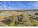 Waterfront property with expansive marsh views and private dock at 6411 China Back Ln, Meggett, SC 29449