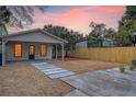 Private backyard with a patio and wooden fence at 929 Rutledge Ave, Charleston, SC 29403