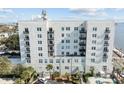 Exterior view of a white building with balconies at 1 King St # 503, Charleston, SC 29401
