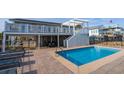 Inviting private pool with patio and pergola at 1308 Palmetto Blvd Blvd, Edisto Beach, SC 29438