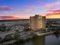 Aerial view of building at sunset, near water at 14 Lockwood Dr # 6H, Charleston, SC 29401
