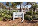 Marsh Walk Villas sign in front of building at 2014 Long Bend Dr, Seabrook Island, SC 29455