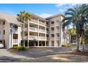 Three-story building with balconies and parking at 2014 Long Bend Dr, Seabrook Island, SC 29455