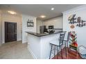 Modern kitchen with white cabinets and granite at 2244 Ashley Crossing Dr # 333, Charleston, SC 29414