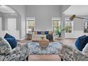 Open living area with hardwood floors and plenty of natural light at 226 Comiskey Park Cir, Summerville, SC 29485