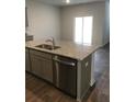 Kitchen island with granite countertop, double sink, and dishwasher at 229 Grand View Xing, Summerville, SC 29483