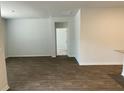 Spacious living room with dark brown wood-look flooring at 229 Grand View Xing, Summerville, SC 29483