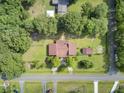 House with a large backyard surrounded by trees at 506 Gross Ave, Moncks Corner, SC 29461