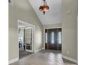 Bright entryway with tile floors and a chandelier at 506 Gross Ave, Moncks Corner, SC 29461