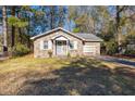 Brick ranch house with attached garage and a spacious yard at 1134 S Shadow Dr, Mount Pleasant, SC 29464