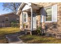 Brick front porch with white columns and steps at 1134 S Shadow Dr, Mount Pleasant, SC 29464