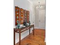 Bright entryway with hardwood floors and unique decor at 155 Wingo Way # 418, Mount Pleasant, SC 29464