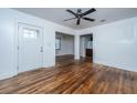 Bright living room with hardwood floors and a ceiling fan at 2749 E Surrey Dr, North Charleston, SC 29405