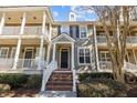 Attractive townhome with a classic facade and brick steps leading to the entrance at 2971 Treadwell St St, Mount Pleasant, SC 29466