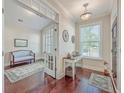 Bright entryway with hardwood floors and views into a home office at 311 Calm Water Way, Summerville, SC 29486