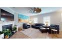 Living room featuring a large TV and comfortable seating at 3419 Fairwater Pl, Mount Pleasant, SC 29466