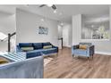 Open living area with hardwood floors and a view to kitchen at 4587 Summey St, North Charleston, SC 29405