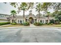 Community center with palm trees and a welcoming entrance at 1300 Park West Blvd # 1001, Mount Pleasant, SC 29466