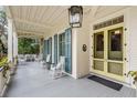 Spacious front porch features rocking chairs and access to the home's entrance at 1738 Ion Ave, Sullivans Island, SC 29482