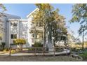 Two-story home with wooden walkway and landscaping at 2335 Tall Sail Dr # 508H, Charleston, SC 29414