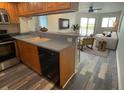 Well-equipped kitchen with stainless steel appliances and light wood cabinets at 3701 Docksite Rd # 320, Edisto Beach, SC 29438