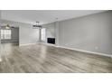 Spacious dining area with wood-look floors and modern light fixture at 114 Avalon Rd, Summerville, SC 29483