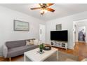 Relaxing living room with a sofa, coffee table, and flat-screen TV at 2236 Bailey Dr, North Charleston, SC 29405