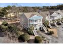 Elevated view of the house, showing landscaping and driveway at 3038 Fraserburgh Way # 2200, Mount Pleasant, SC 29466