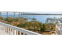 View from balcony overlooking the water and bridge at 310 Longshore St # 645, Daniel Island, SC 29492