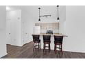 Modern kitchen with granite countertops and breakfast bar at 500 Bucksley Ln # 205, Charleston, SC 29492