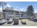 Exterior view of building, multiple units, and parking at 702 Greenmeadow Dr, Goose Creek, SC 29445